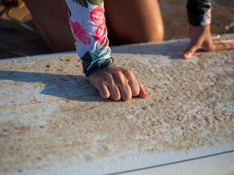 Surfboards easily get dirty by sand